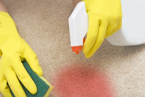 Professional carpet cleaning team working in a Preston home