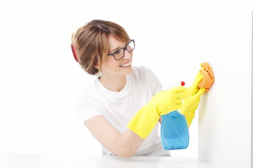 Technician wearing PPE while carrying out carpet cleaning work